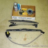 No Shipping.  A/C refrigerant; spark plugs labeled 'for '83 Honda'; wiper blades; tire air gauge;