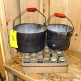 Two scalding style pots with holes for plant drainage; wooden crate with glass jars, crate measures