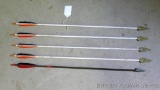 five fiberglass arrows with broad heads are 31