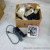 Box full of electrical components incl power strips, outlets, light bulb fixtures, switches, plates,