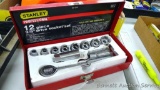 Stanley Professional 12 pc 3/8 drive socket set in a metal carrying case.