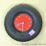 Unique tire clock made from a cut off Carlisle 15 x 6.00-6 tire. Tire is 13-1/2