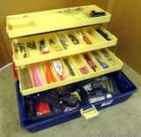 Three shelf tackle box filled with archery supplies including broad heads, feathers, nocks,
