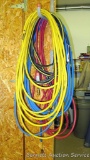 4 Sections of air hose of various lengths, approx 25' to 50'.