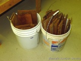 Two 5 gallon pails partial filled with cedar shakes, largest is 7