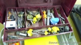 Plano tackle box filled with router bits and parts, largest is 2