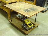 Homemade work table on rollers is 34