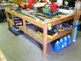 Homemade heavy duty wooden work table with lower shelf is 4' x 8' x 35