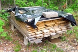 Pile of stickered rough sawn oak boards up to 10