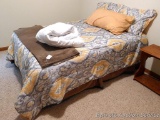Full sized bed frame, mattress, box spring and bedding. Nice newer mattress looks comfortable.