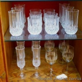 Champagne flutes, tumblers and glasses, matched set of eighteen glasses all in good condition. Four