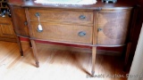 Beautiful antique buffet is in very good condition. Top drawer is lined and divided for flatware.