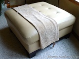 Nice accent piece could serve as extra seating, ottoman or a casual coffee table. Piece is in good