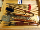 Grilling tools including turners, forks, skewers, tongs, etc.