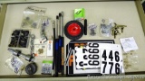 Contents of drawer includes adhesive numbers/letters, grease fittings, ball joint ends, plow bolts,