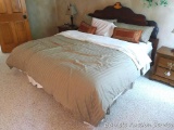 King size bed has a custom platform that incorporates an antique headboard. Comes with newer Bamboo