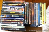 DVDs including Fantastic 4, Pirates of the Caribbean, High School Musical, Pearl Harbor, Freaky