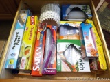 Partial rolls and boxes of snack bags, parchment paper, foil, ziploc bags, coffee filters, more.