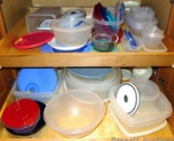 Assorted Tupperware and other plastic containers, as pictured.