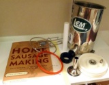 LEM sausage stuffer; chicken rack; Home Sausage Making cookbook.