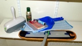 Norwex mop with mop and sweeper, extension handle, a couple of Norwex cloths; other lint roller,