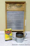 Vintage Sunny Monday washboard, vintage Rex wall size and sealer; little decorative watering can.