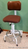 Nice adjustable stool swivels and rolls easily. Great for drafting table work. Seat is currently at