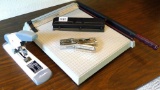 Swingline heavy duty stapler; three hole punch; Ace Fastener Co. stapler; Premier paper trimmer.