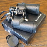 Bushnell Sportview Insta-Focus 10x50 wide angle binoculars with case and lens caps. Binoculars focus