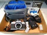 Minolta XG-1(n) 35mm camera with lens, a couple of rolls of film, Focal DA-2000 detachable flash,