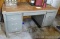 Metal six-drawered desk is about 34