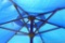 Nice blue solar patio umbrella, no holes noted. Measures approx 56