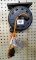 Hanging extension cord reel is about 7