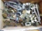Box of cabinet hinges and door handles. Handles measure 4-1/2