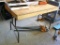 Wooden work table with metal legs is 30