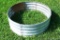 Galvanized steel fire ring is 3' x 1'.