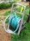Rustproof portable hose reel with hose.