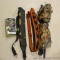 Advantage Timber camo blind section; leather and synthetic rifle slings; Masterlock brand gun lock.