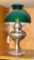 Antique Success brand oil lamp is in good condition and comes with green glass shade, no chimney.