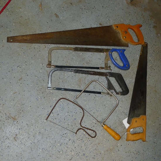 Several saws including coping, cross cut and hack saws. Longest is about 30". Brands include