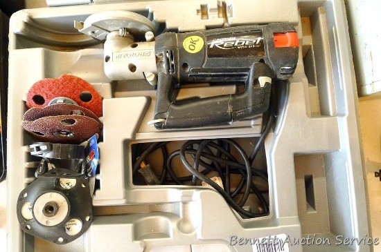 Rotozip Rebel spiral saw with manuals, sanding discs, bits, and case. Model Rebel Type 3, runs. Cord