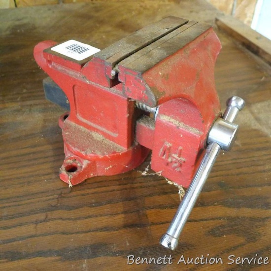 Sear 4-1/2" swiveling bench vise. Jaws look to be in good condition, just missing a screw. Jaws are