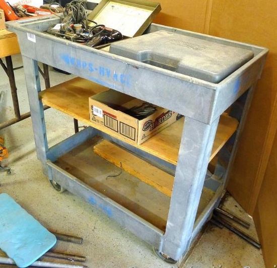 Rubbermaid 2 shelf tool cart on wheels has adjustable brackets for more shelving. Total size is