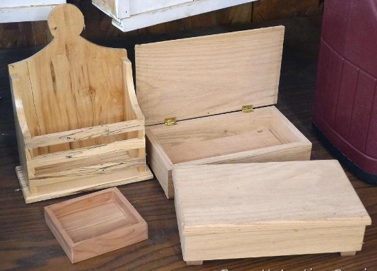 Two handcrafted boxes 5-1/2" x 9" x 2-3/4"; napkin holder; one other small box.
