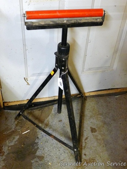 Tripod roller stand can extend over 42". Roller is 12-3/4" wide, rust noted on base. See pictures.