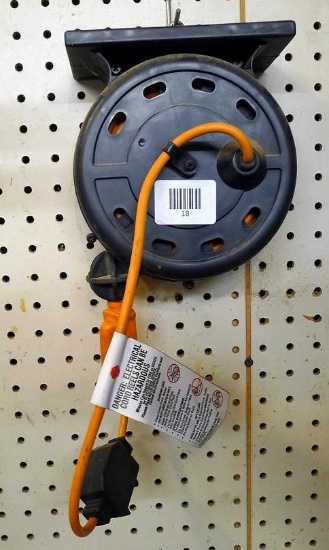 Hanging extension cord reel is about 7" tall. Marked 2GA8, Cat No WL2010.