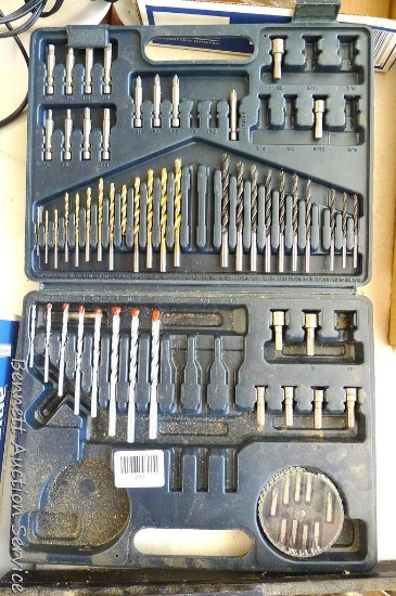 Power drill accessories including drill bits, screw driver bits, metric nut drivers all in storage