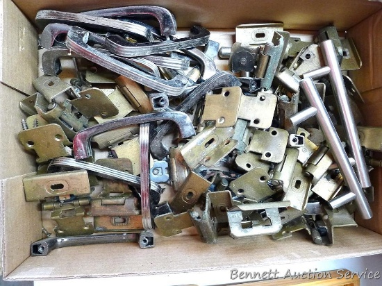 Box of cabinet hinges and door handles. Handles measure 4-1/2" long.