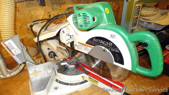 Hitachi C10FSH Slide Compound Saw has a laser marker and comes with manual and 2 attachments. Runs,