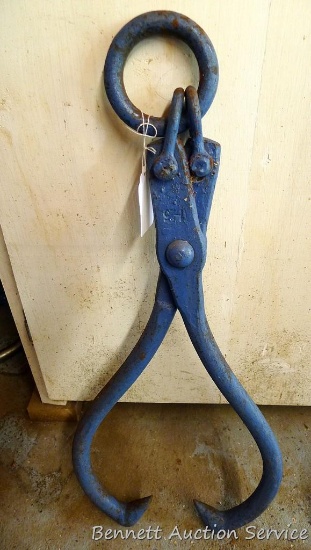 Logging tongs about 26" tall. Opens to 24" inside of jaws. Marked 1-25.